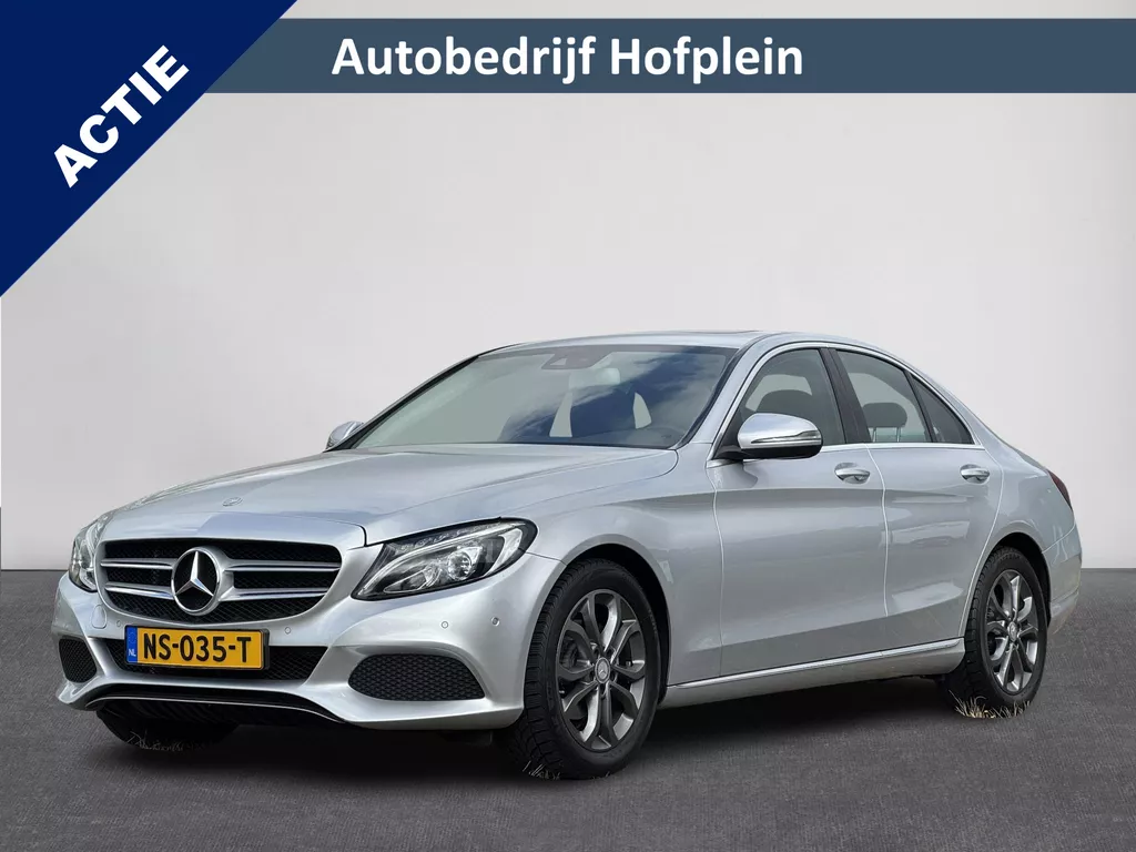 Mercedes-Benz C-klasse C180 Prestige Automaat Navigatie | LED Verlichting | Dode Hoek Detectie | Panorama schuif/Kanteldak, Elektrisch | Stoelverwarming | PDC | Automatische Airco | 17"Lmv | Halfleer | Sportstoelen | INCLUSIEF EXTRA ORIGINELE SET LICHTMETALEN VELGEN (vestiging Vianen) Mercedes-Benz C-klasse C180 Prestige Automaat Navigatie | LED Verlichting | Dode Hoek Detectie | Panorama schuif/Kanteldak, Elektrisch | Stoelverwarming | PDC | Automatische Airco | 17"Lmv | Halfleer | Sportstoelen | INCLUSIEF EXTRA ORIGINELE SET LICHTMETALEN VELGEN (vestiging Vianen)